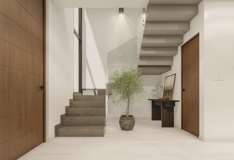 Modern minimalist hallway with concrete stairs, potted plant, and wooden doors on white walls