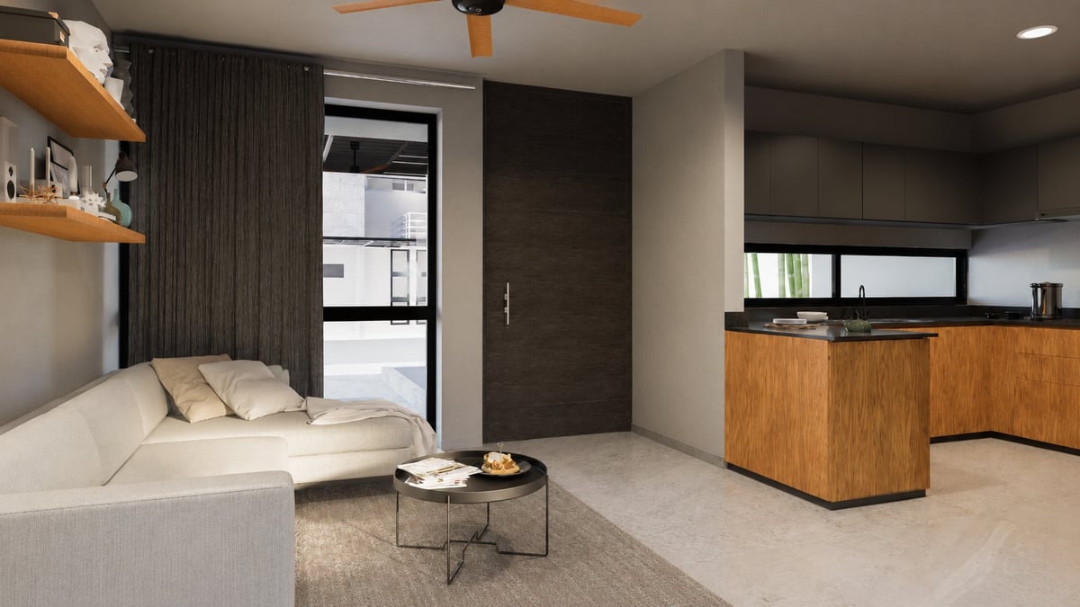 Modern studio apartment with cream sofa, wooden kitchen island, ceiling fan, and large windows overlooking city street