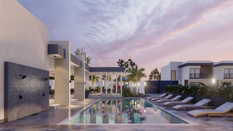 Modern luxury resort with illuminated pool, lounge chairs, and contemporary white buildings at twilight